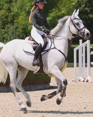 Białe bryczesy jeździeckie z lejem kolanowym Royal Equestrian